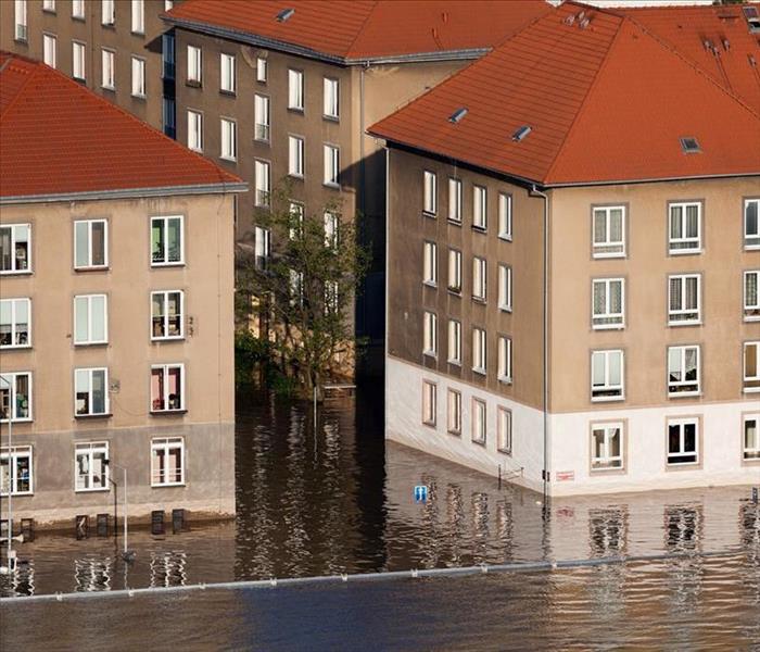 Buildings are partially under water from a flood. 