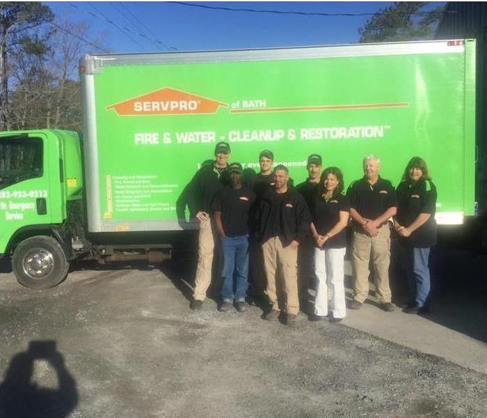 Image of SERVPRO of Bath team standing in front of a truck