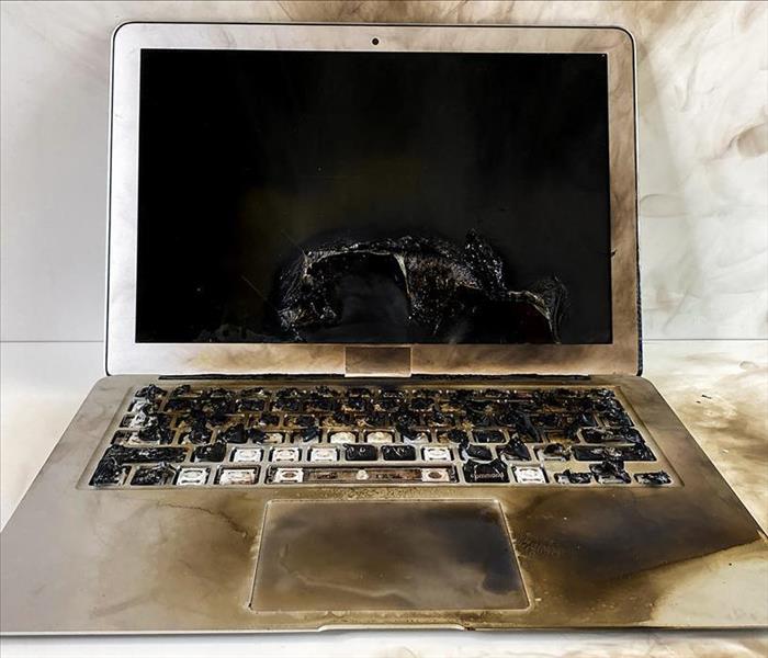 Fire damaged laptop.