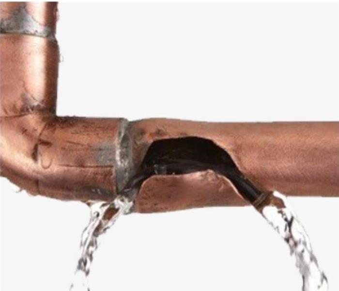 Image of a broken pipe leaking water.